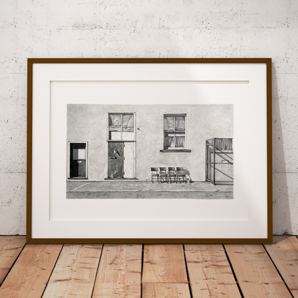 15 Lawson Street print in a slim wooden frame with a white mount, leaning against a concrete wall